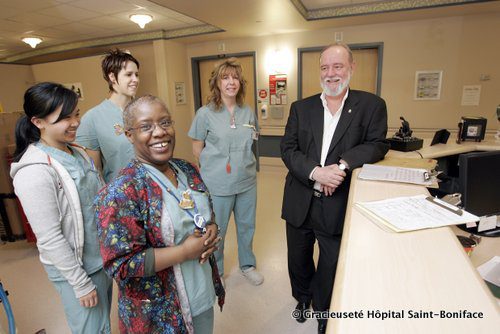 ST. BONIFACE HOSPITAL - "Future of Health Care in MB"Dr. Michel Tetreault, President and CEO, St. Boniface General Hospital, poses with staff in the LDRP on Thursday, March 28, 2007. (Photo by Marianne Helm)