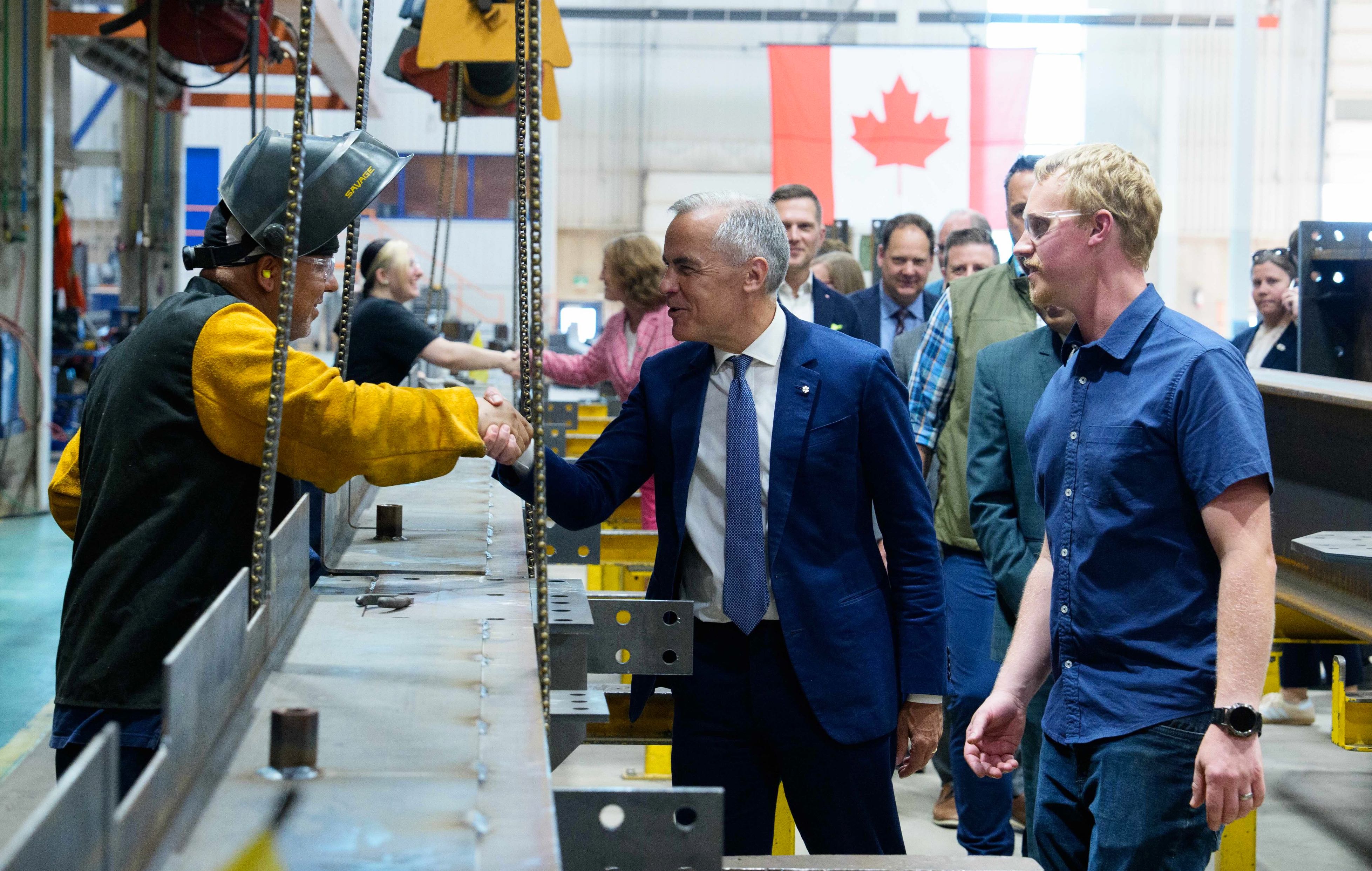 Mark Carney était en visite dans une entreprise de fabrication d’acier à Hamilton, en Ontario.