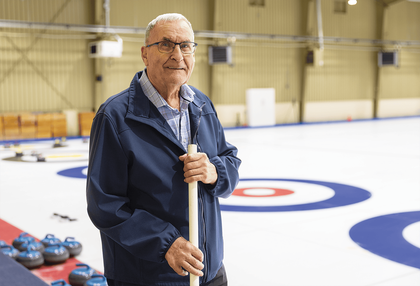 Réginald Robert sur la glace au Heather Curling Club.